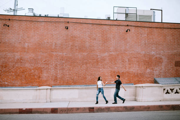 istock Happy Hispanic Couple Explore Los Angeles 1210192080