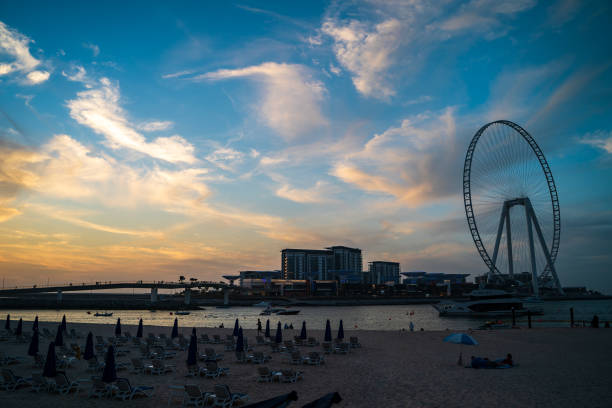 istock Beautiful sunset above Marina Beach in Dubai, UAE 1210192305