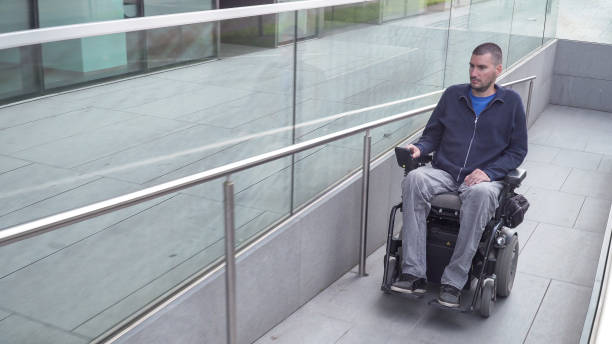 istock Disabled man on wheelchair 1210193831