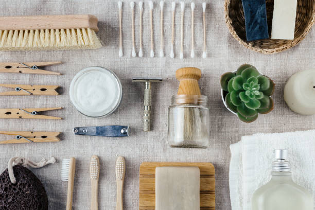 istock Everyday washing accessories arranged on natural background flatlay. 1210195120