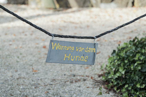 beware of dog german sign, german text translation: beware of dog