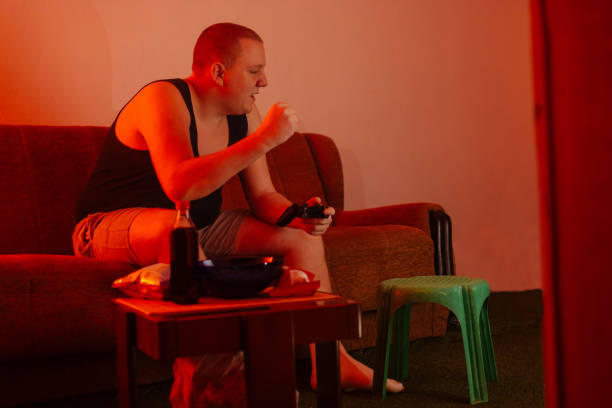 istock Gamer playing video games 1210199249