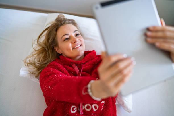 istock Close up woman lying in bed 1210199888