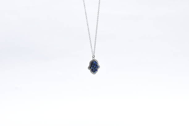 istock Pendant on silver chain isolated on white background 1210199930