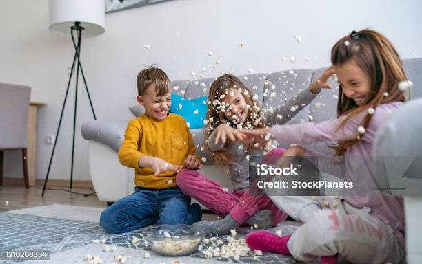 Popcorn Fight Stock Photo - Download Image Now - Chaos, Family, Child