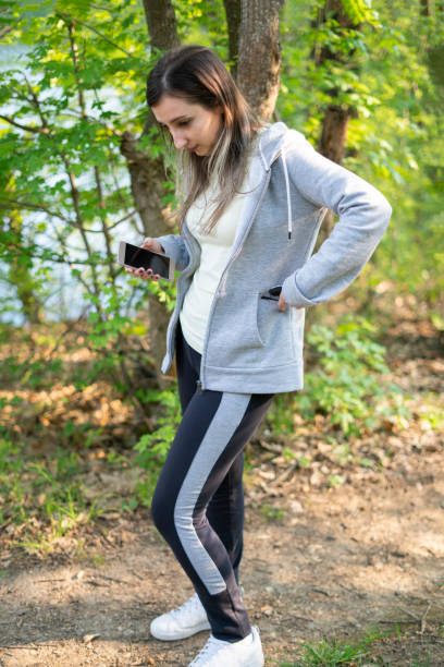 istock Girl in nature thinking about important message 1210200688