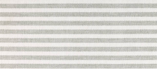 istock Texture with striped coarse fabric of white and gray. 1210208887