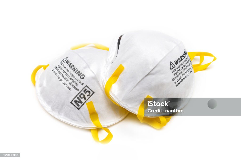 protection factor for N95, covid-19, corona virus Filtering face mask protection factor for N95 Filtering face mask-safety white mask on white background N95 Face Mask Stock Photo