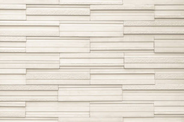 istock Granite tiled wall detailed pattern texture background in natural light beige brown 1210216556