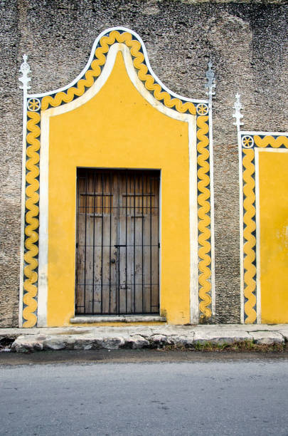 Old doors give character to a building. In Merida, Mexico, they give character to a city, and the colors of the buildings give life.