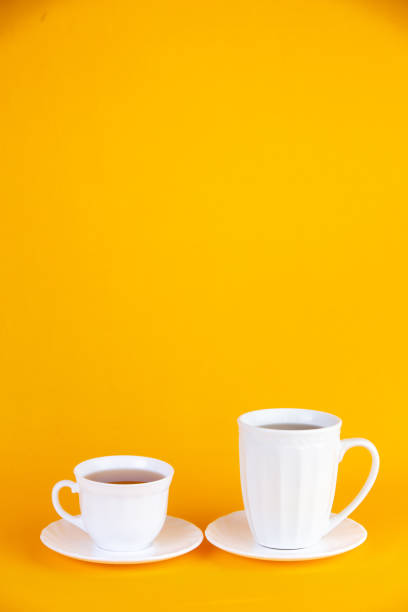 istock Pair of white cups of coffee 1210230815