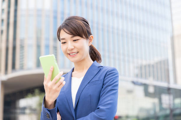 istock asian woman who see a smart phone 1210232978