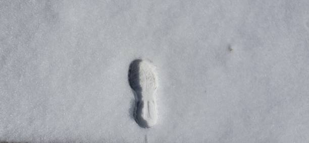 istock footprint on the snow 1210233076