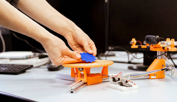 istock 3d scanner the plastic detail on the plate, innovative technology to create models 1210233276