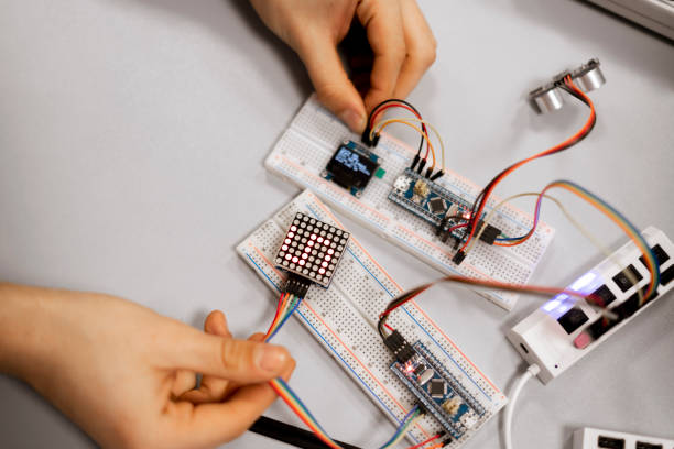 istock professional engineer assemble the details of device with pcb controller and counter with numbers 1210233280