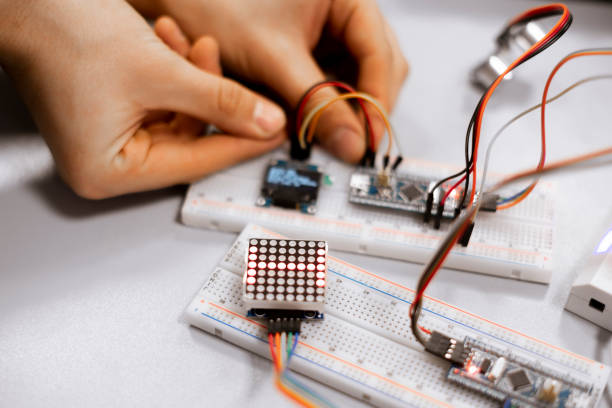 istock professional engineer assemble the details of device with pcb controller and counter with numbers 1210233281