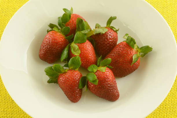 istock Fresh red stawberries in bowl 1210236335