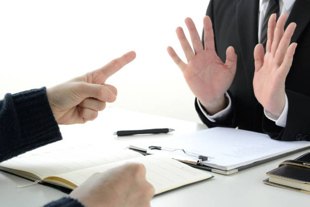 istock Complainer and business man in meeting 1210239425