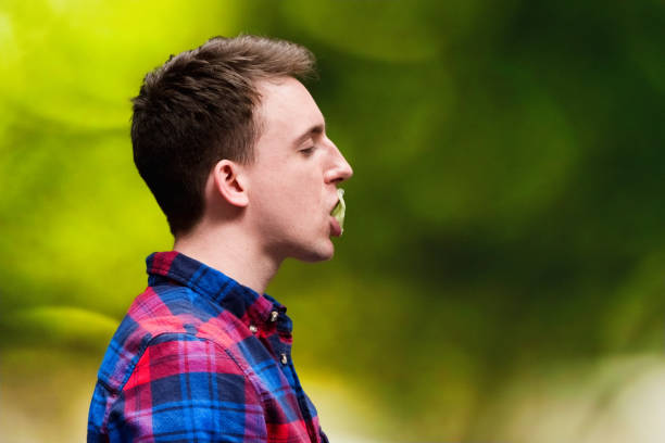 istock In front of defocused background wearing plaid shirt 1210242638