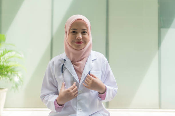 istock Medical Practitioner with stethoscope outdoor 1210245115