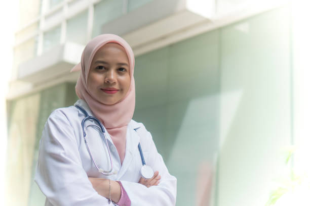 istock Medical Practitioner with stethoscope outdoor 1210245121