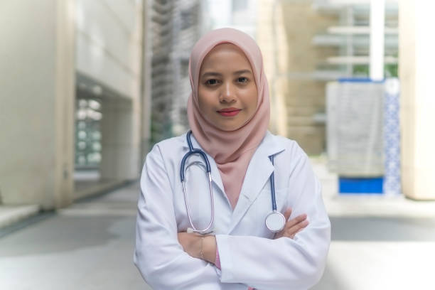 istock Medical Practitioner with stethoscope outdoor 1210245122