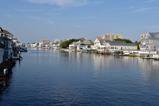 istock Luxury homes, boats and docks line a waterway 1210245352