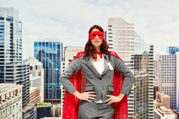 istock Superwoman standing wearing mask - disguise 1210246065