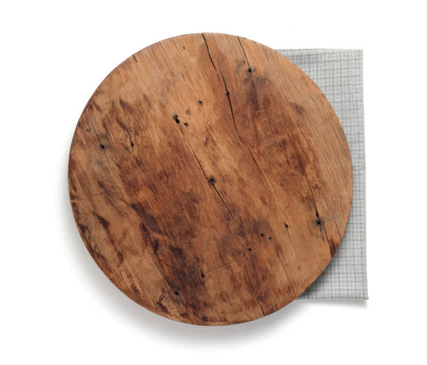 istock Empty wooden tray and napkin isolated on white background 1210247312