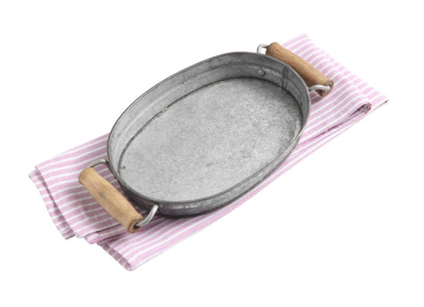 istock Empty metal tray and napkin isolated on white background 1210247320