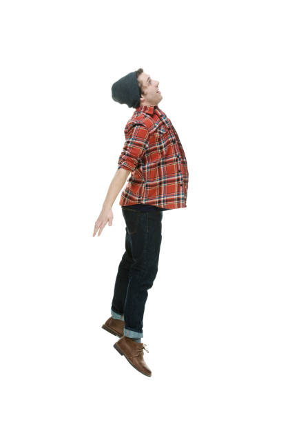 istock Caucasian male flying in front of white background 1210248557