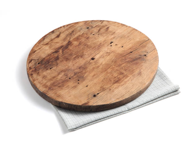 istock Empty wooden tray and napkin isolated on white background 1210249142