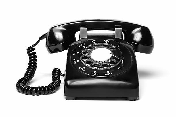 istock An antique black telephone on a white background  121024986