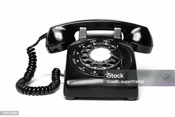 An Antique Black Telephone On A White Background Stock Photo - Download Image Now - Telephone, Rotary Phone, Retro Style