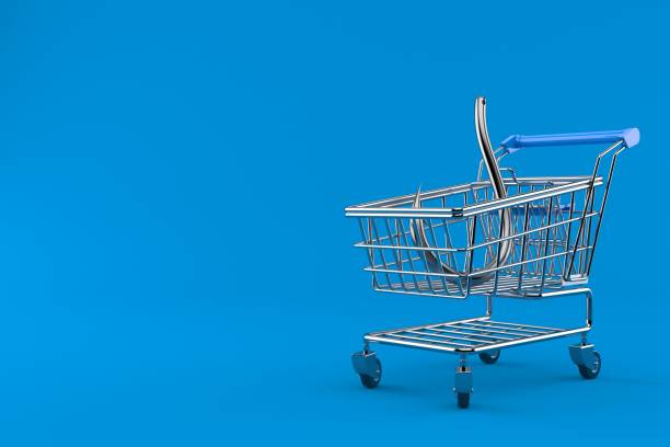 istock Fishing hook inside shopping cart 1210253103