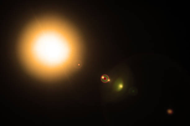 istock Abstract Natural Sun flare or Far star on the black background 1210254574