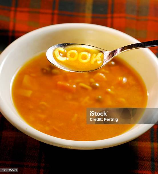 Cook Spelled Out On A Soup Spoon Stock Photo - Download Image Now - Alphabet Soup, Bowl, Color Image