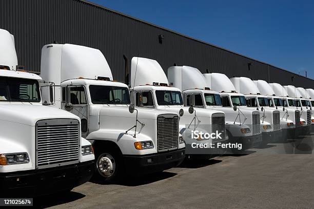 Tractor Trailers In Line Stock Photo - Download Image Now - Fleet of Vehicles, Truck, Semi-Truck