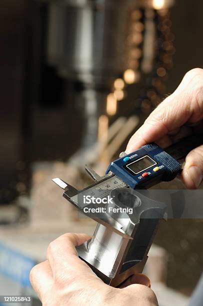 Milling Machine Operator Checking Measurements Stock Photo - Download Image Now - Quality Control, Aerospace Industry, CNC Machine