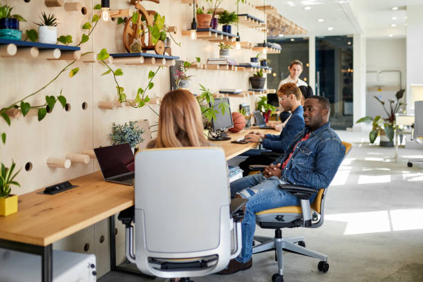 istock Coworking Young Businesspeople Networking in Office 1210265604