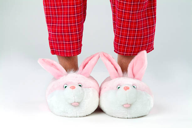 man's legs in bunny тапочки - пижама стоковые фото и изображения