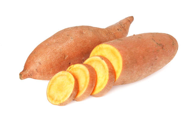 istock Sweet potatoes with slices isolated on a white background 1210265983