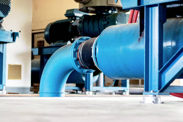 istock Industrial blowers in a duty cycle. Low angle. 1210267931