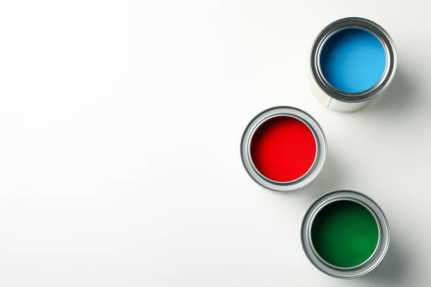 istock Cans of different paints on white background, top view 1210268668