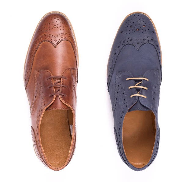 istock Classic male shoes isolated on a white, top view 1210270200