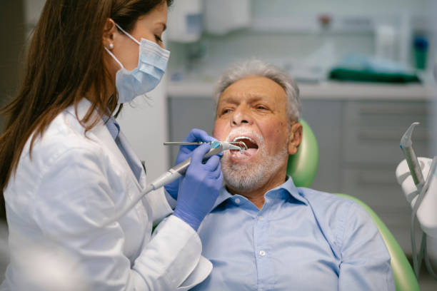 istock Senior man at the dentist 1210278964