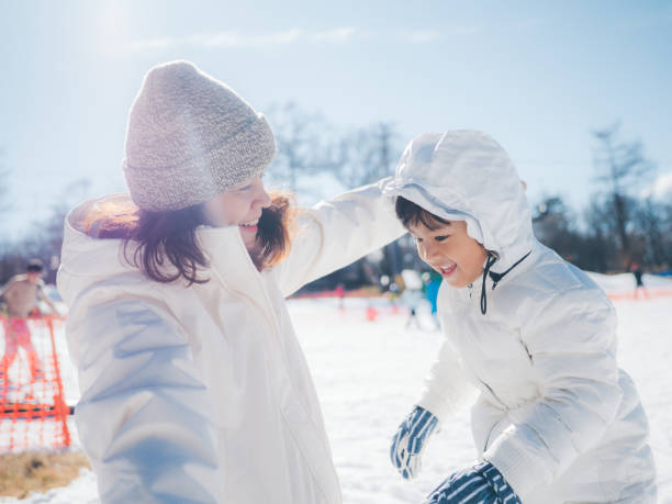 Family Building A Snowman