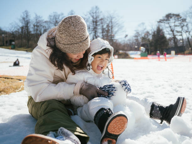 Family Building A Snowman