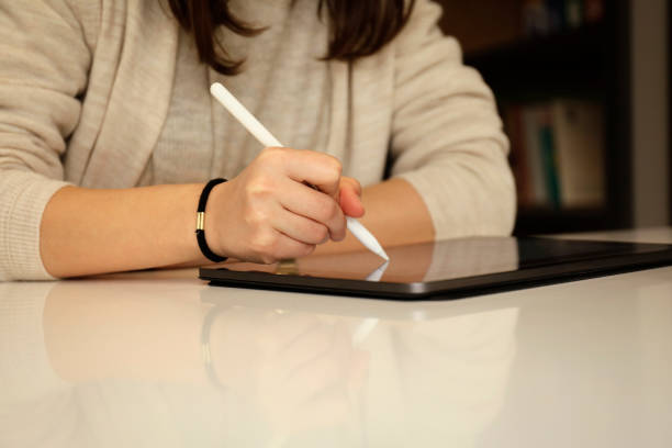 istock Female designer using graphic tablet and stylus pen 1210286295