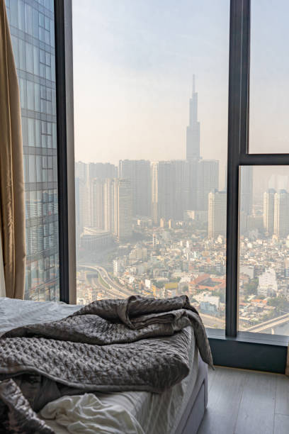 istock Cityscape view with hazy air polluted sky from bedroom 1210287992
